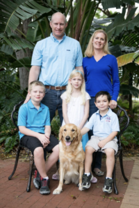 The Martin family with breeder dog Mary.