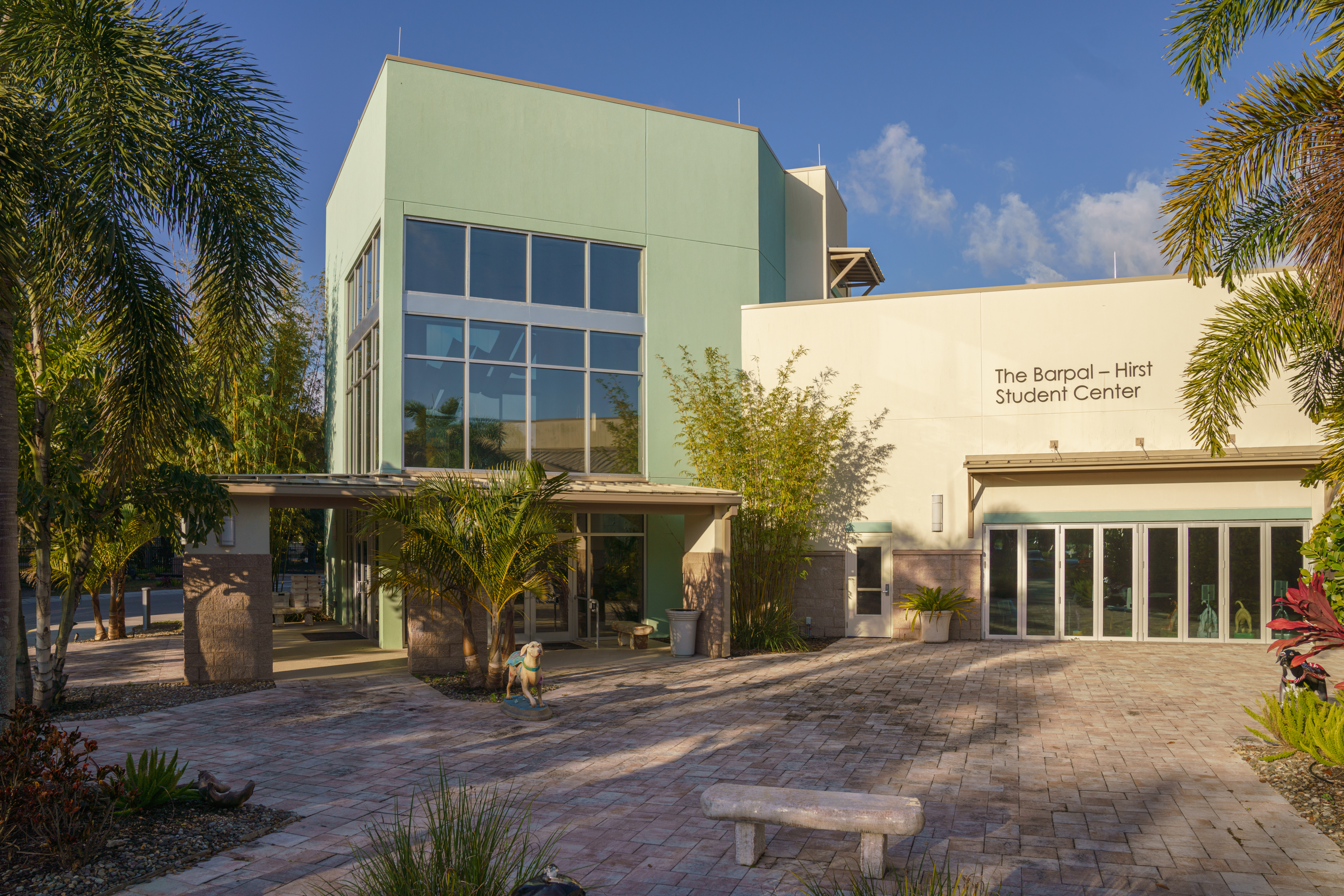 A photo of the exterior of The Barpal - Hirst Student Center at the Dogs Inc campus in Palmetto, Florida.