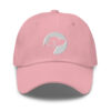 A pink baseball hat with the Dogs Inc circle logo stitched in white.