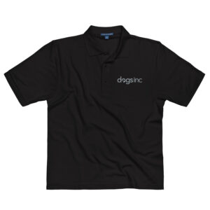 A black polo with the Dogs Inc logo stitched on the top left in gray.