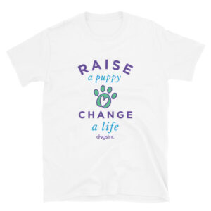 A white unisex t-shirt with a graphic paw print and 'Raise a Puppy Change a Life' text in purple and blue.