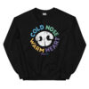 A white crewneck with a white nose print graphic and 'Cold Nose Warm Heart' text in blue, green, yellow, and purple.