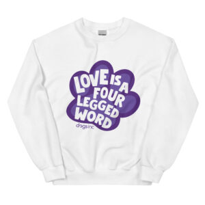 A white crewneck with 'Love is a Four Legged Word' text inside a purple paw print graphic.
