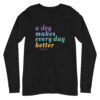A black long sleeve t-shirt with 'A Dog Makes Every Day Better' graphic text in purple, blue, green, and yellow.