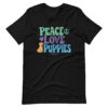 A black unisex t-shirt with a dog graphic and 'Peace Love Puppies' text in green, purple, and blue.