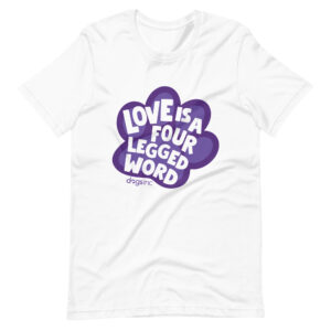 A white unisex t-shirt with 'Love is a Four Legged Word" text inside a purple paw print graphic.