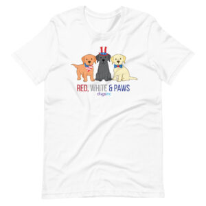 A white unisex t-shirt with a graphic of three dogs and 'Red, White & Paws' text in red, white, and blue.