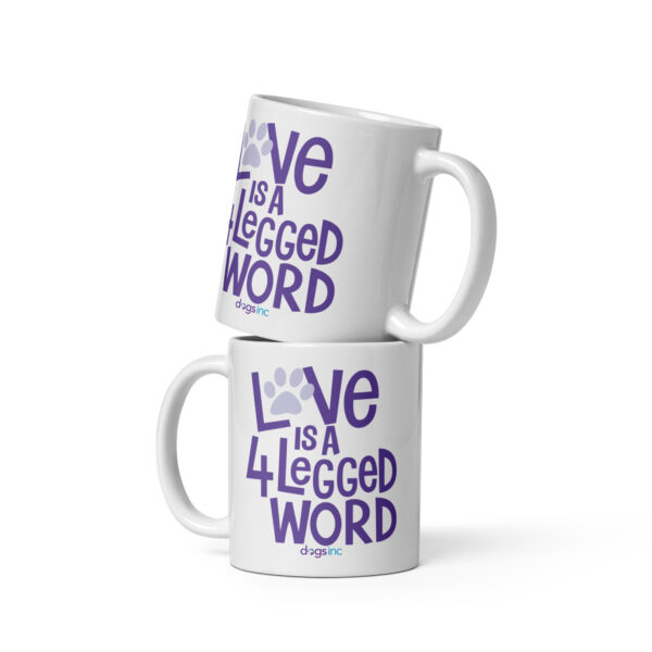 A white coffee mug with 'Love is a 4 Legged Word' graphic text in purple.