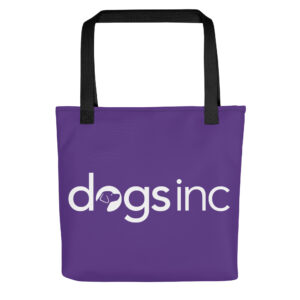 A purple tote bag with the Dogs Inc logo centered in white.