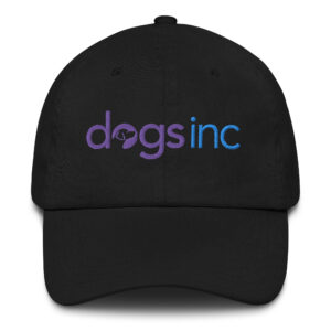 A black dad hat with the Dogs Inc logo embroidered in purple and blue.