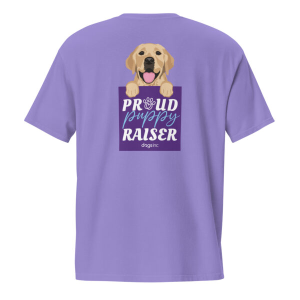 The back of a violet unisex t-shirt with a dog graphic and 'Proud Puppy Raiser' text in a purple box on the back.