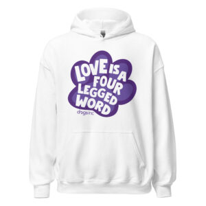 A white sweatshirt with 'Love is a Four Legged Word' text inside a purple paw print graphic.