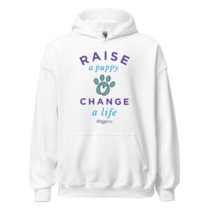 A white sweatshirt with a graphic paw print and 'Raise a Puppy Change a Life' text in purple and blue.