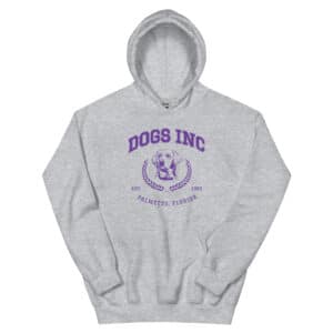 A grey pullover sweatshirt with a hood and a purple design that reads, "Dogs Inc" "est. 1982" and "Palmetto, Florida." An illustration of a Labrador dog head is in the middle.
